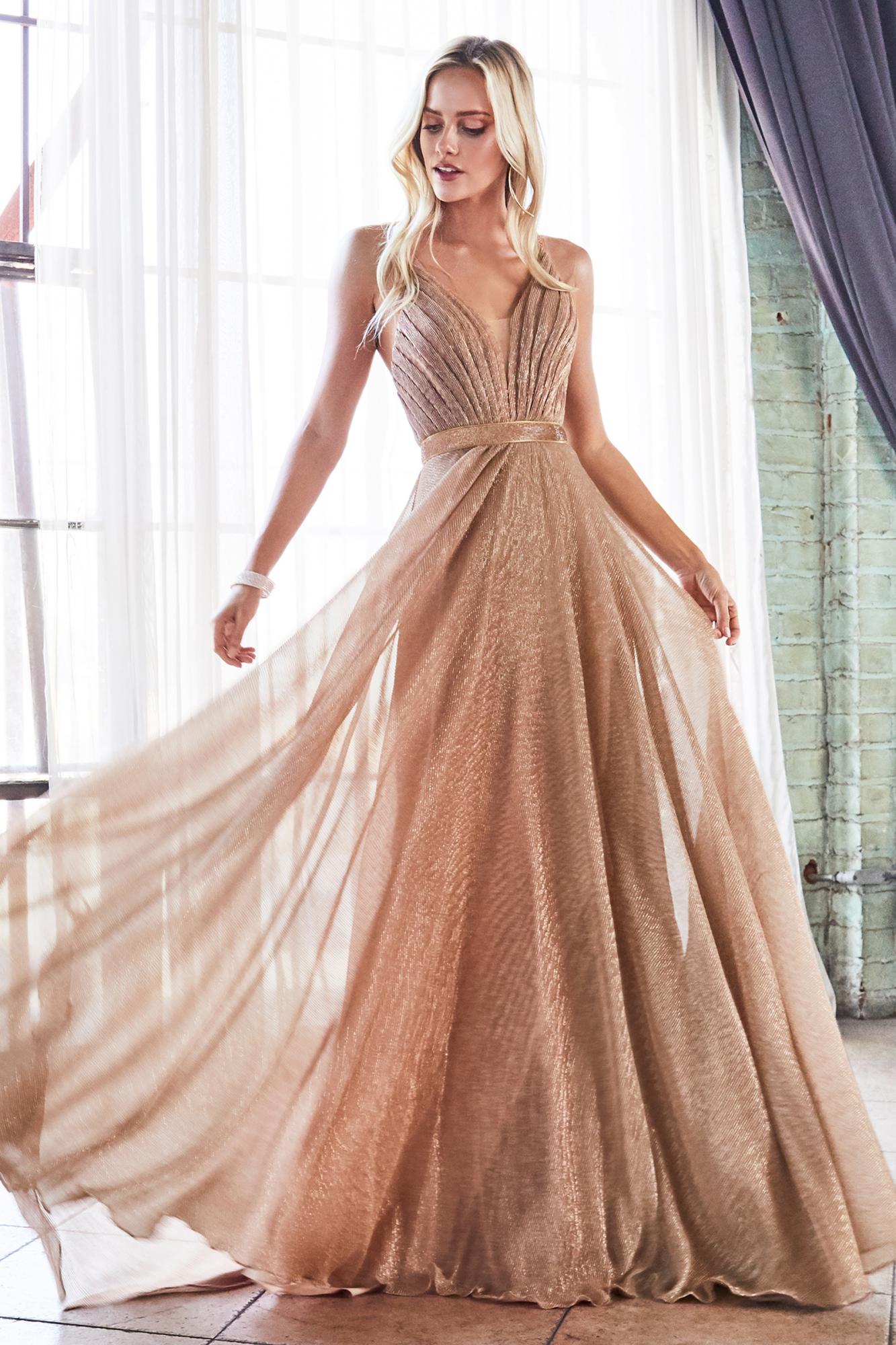 A-line metallic micro pleated gown with embellished belt and criss cross back. pink gold