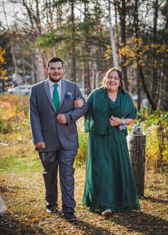 Tuxedo and green bridemaid dress